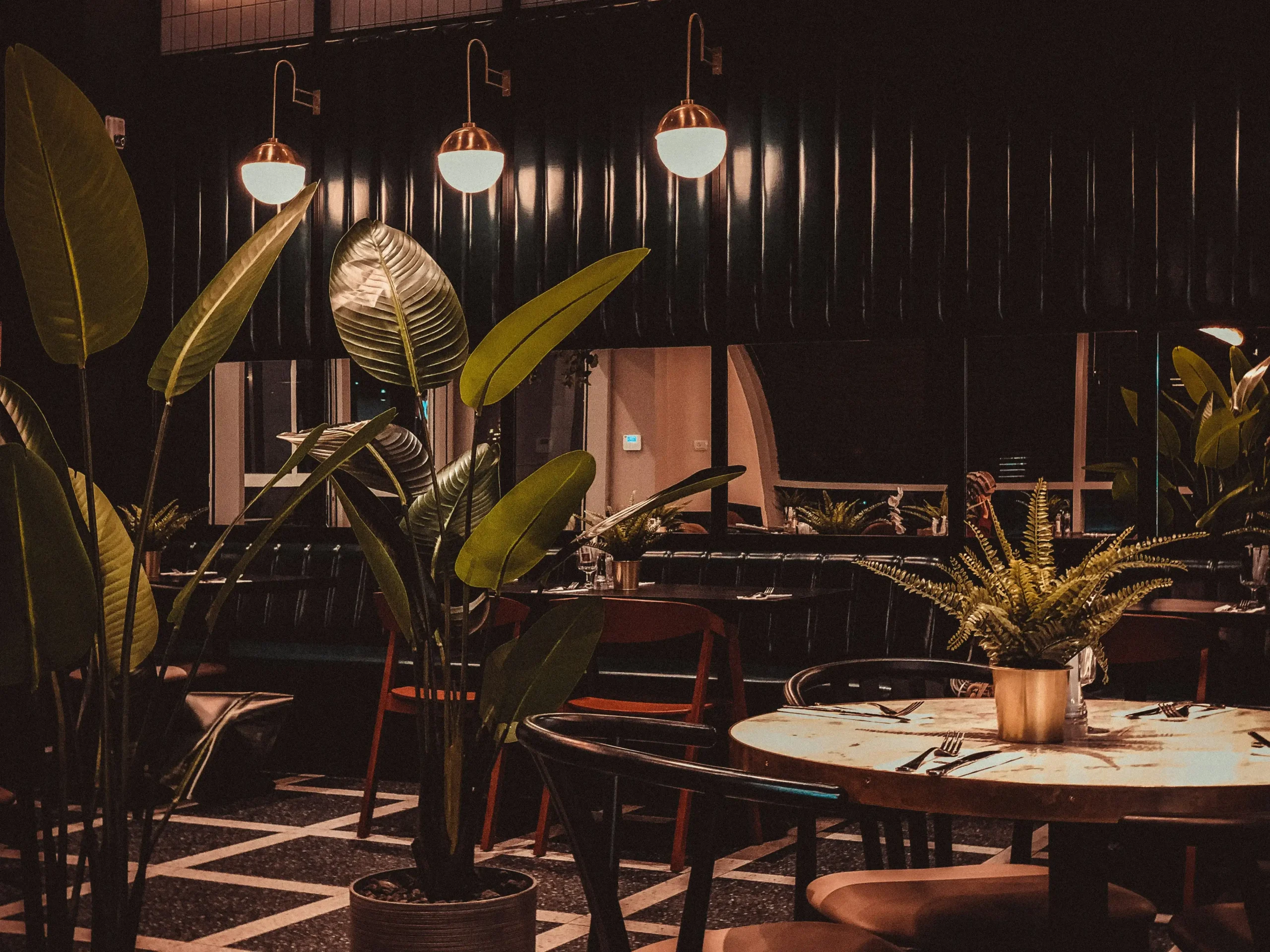 Restaurant interior design with warm lighting and decor creating an inviting ambience