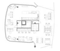 Floor plan of the rounded Basics Coffee unit by archicraft, showing the central service core, seating loops and terrace tables