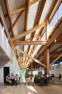 Cafe seating under the glulam roof at Doutor Leite Lopes State Airport