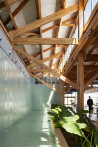 Glulam trusses above the interior water feature at Doutor Leite Lopes State Airport