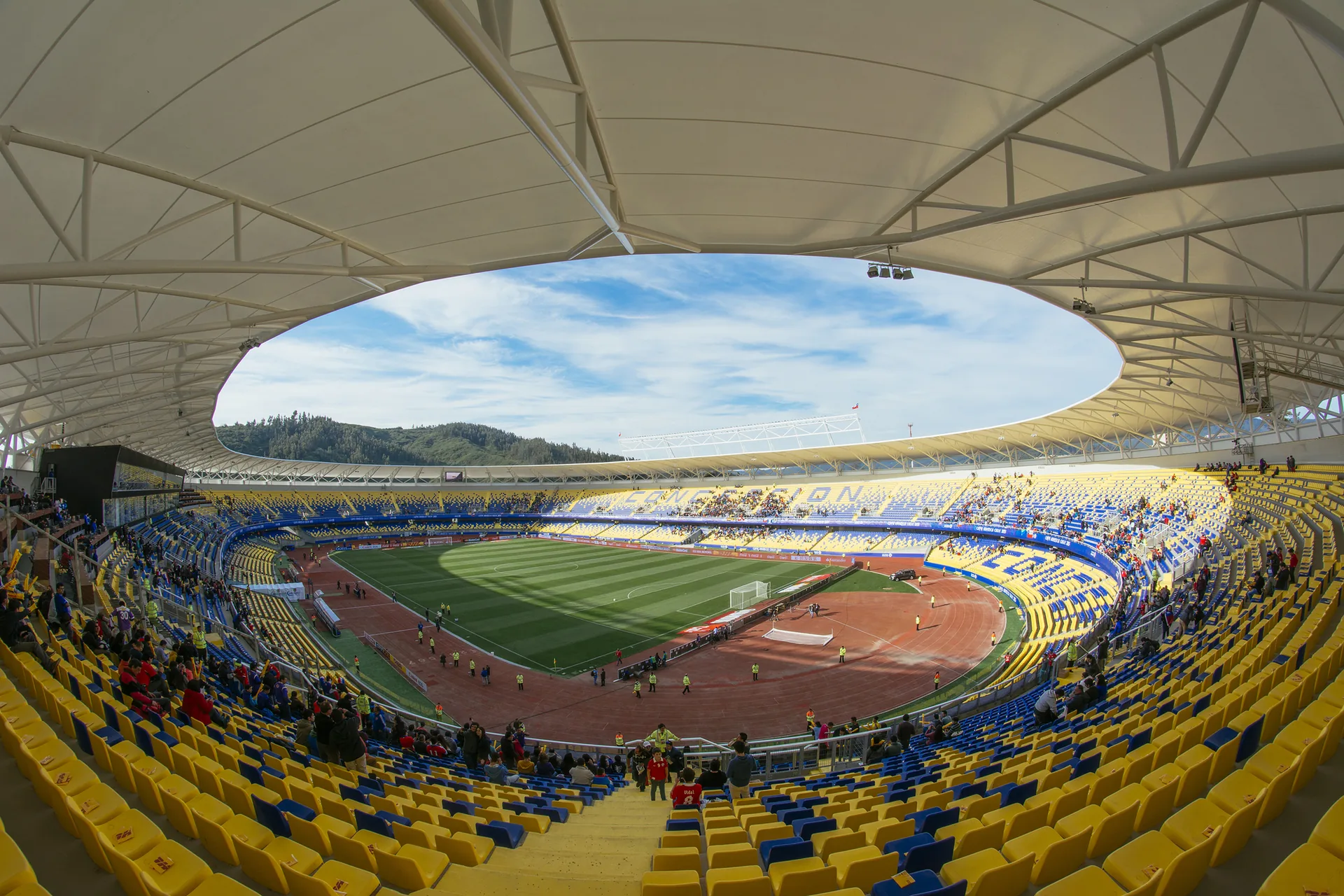 Ester Roa Rebolledo Municipal Stadium by Valle Cornejo Arquitectos under its roof ring