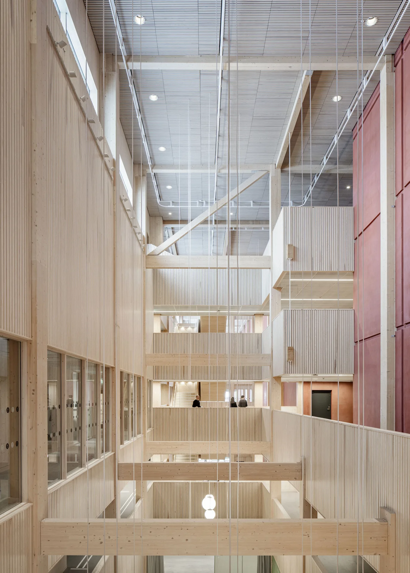 The daylit atrium between the concrete archive and the timber wing, National Archives of Sweden