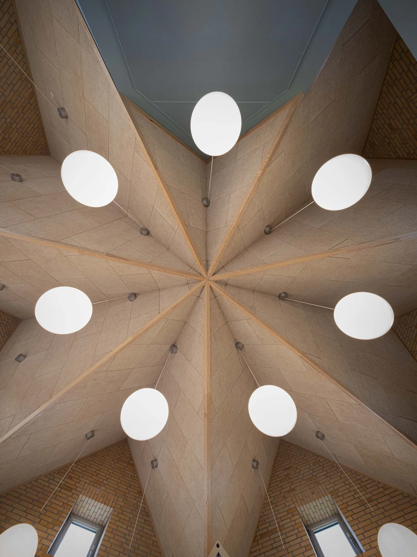The underside of the heptagonal roof structure at Tidsmaskinen After-School Center