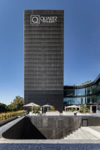 The hotel tower and street plaza at New City Medical Plaza by CRAFT Arquitectos