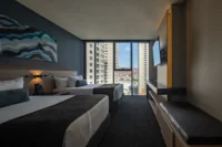 Hotel room looking over Tijuana at New City Medical Plaza by CRAFT Arquitectos