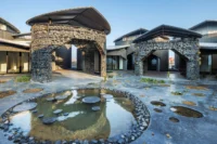 Central pond in the courtyard of Future Life Village Pavilion by KOMPAS