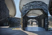 The ring circulation path under the canopies at Future Life Village Pavilion