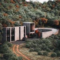 Rendering of the house seen from the dirt access track through the Gilan forest, Savan House by Nobico Studio