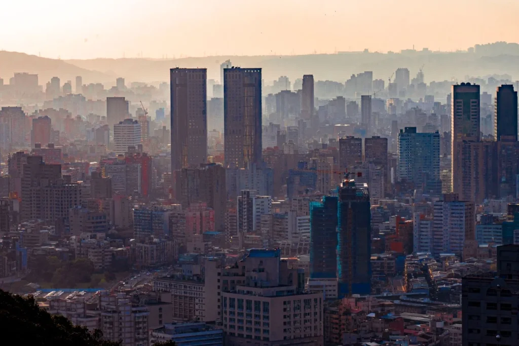 City skyline fading into morning haze, the depth effect that Photoshop tips for architects recreate with soft gradients