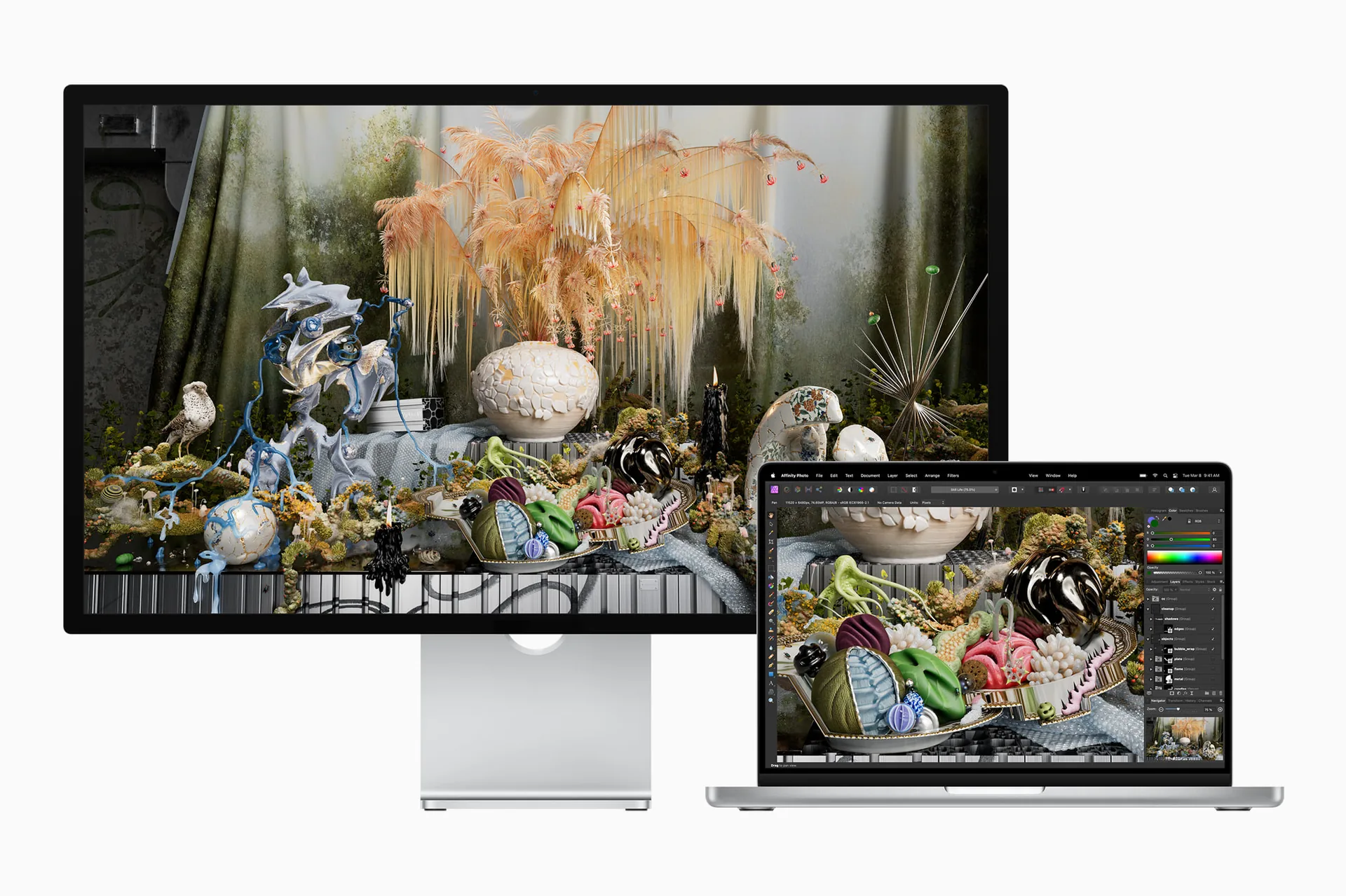 Apple Studio Display beside a MacBook Pro, both showing the same detailed still life artwork in an editing app