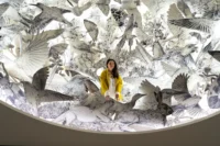Es Devlin: Other Worlds Opens at London’s Design Museum with a 2,000-Book Kinetic Library