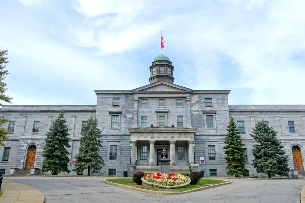 Stone facade and cupola of the Arts Building at McGill University in Montreal