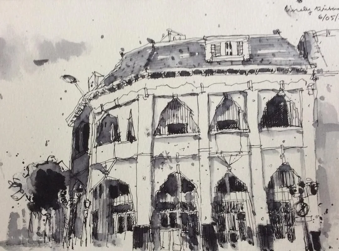 Ink and wash sketch of an ornate heritage facade with arched windows, loose lines and expressive ink splashes