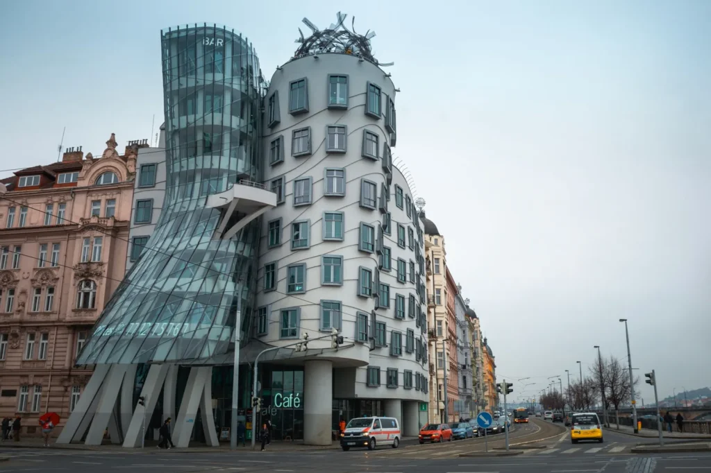Dancing House in Prague, a Frank Gehry architecture landmark with a pinched glass tower beside a rounded concrete one